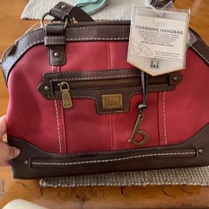 Charging handbag nwt, never used